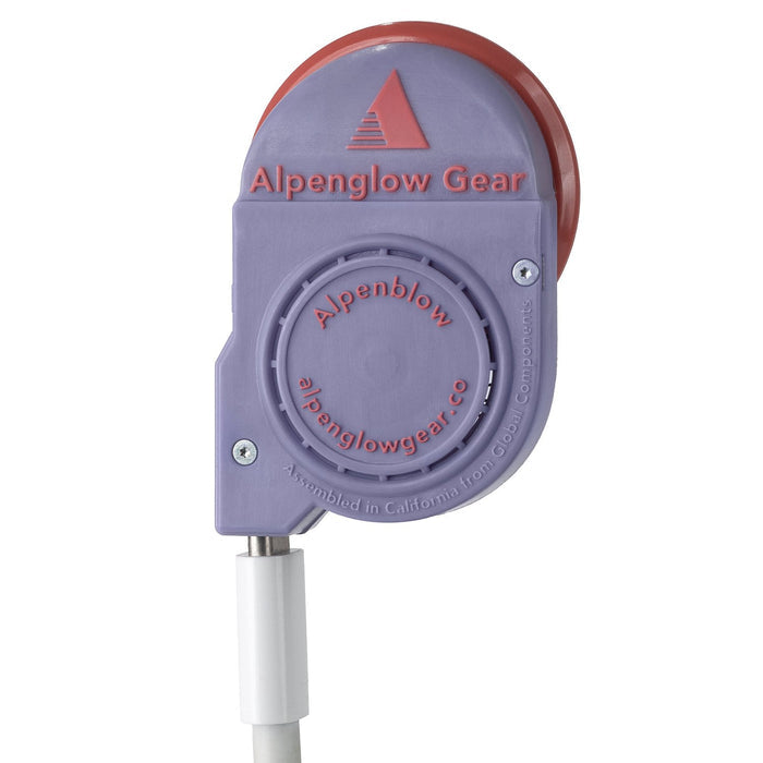 Alpenblow Micro Inflator model 2025 with pink nozzle, front studio view showing Alpenglow Gear logo