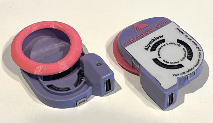 Alpenblow Micro Inflator disassembled next to an assembled unit, showing internal fan and nozzle