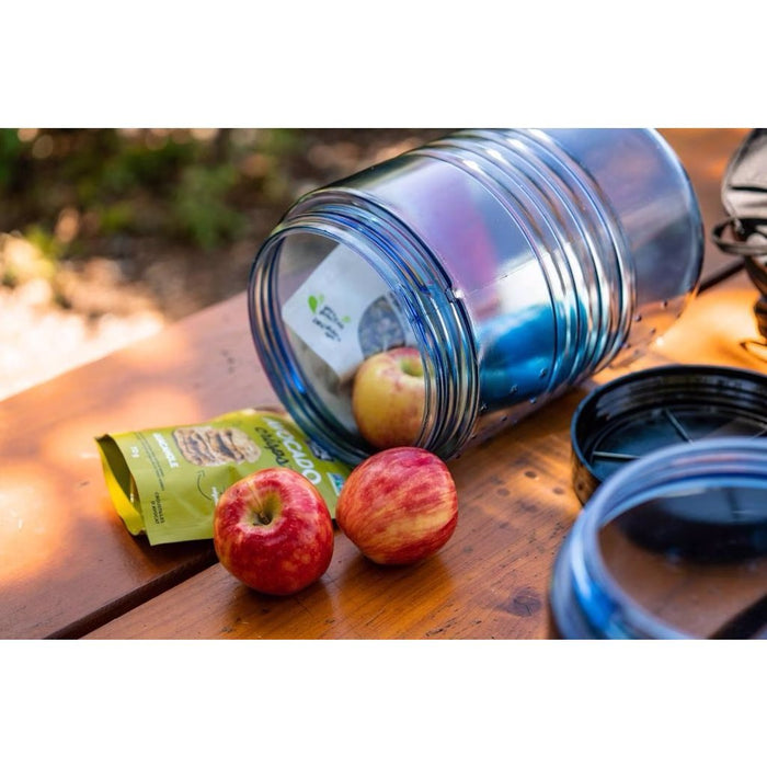 BearVault BV500-Journey canister open on a picnic table with food