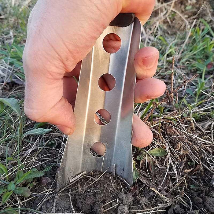 BoglerCo Ultralight Trowel held in hand over grass