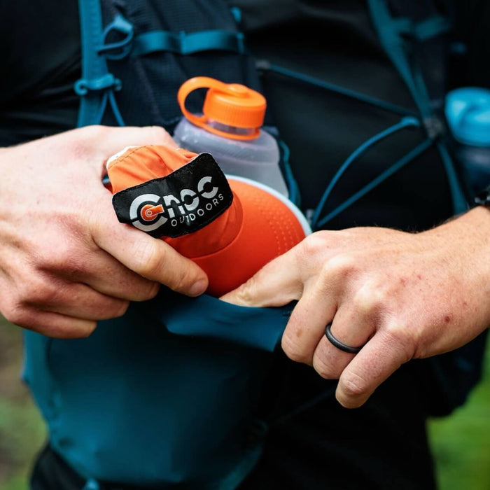 CNOC Hydriam Collapsible Flask held outdoors