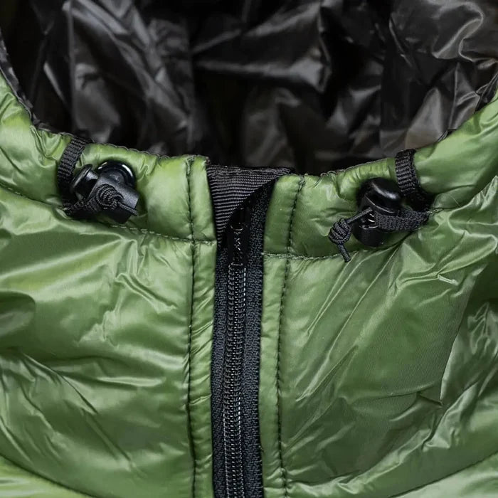 Enlightened Equipment Torrid Apex Jacket Men's in green – stuffing into its chest pocket