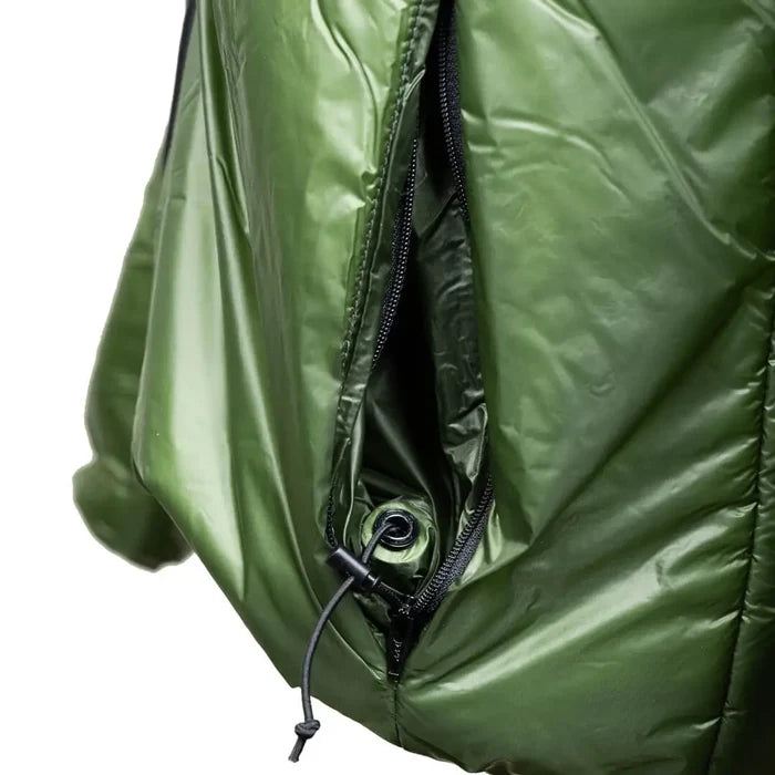 Enlightened Equipment Torrid Apex Jacket Men's in green – packed into its own pocket