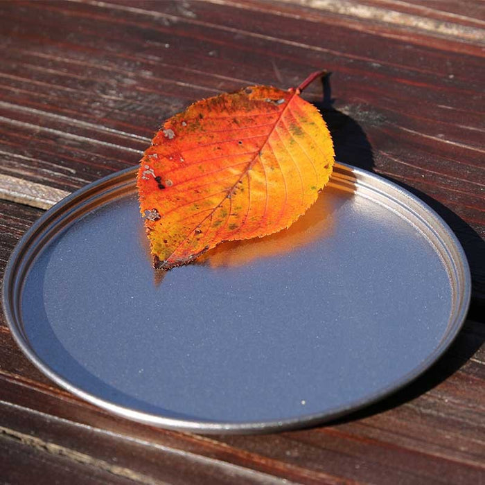 EVERNEW MulTidish Lid for Ti Cup 400&760 – titanium dish on a wooden table outdoors