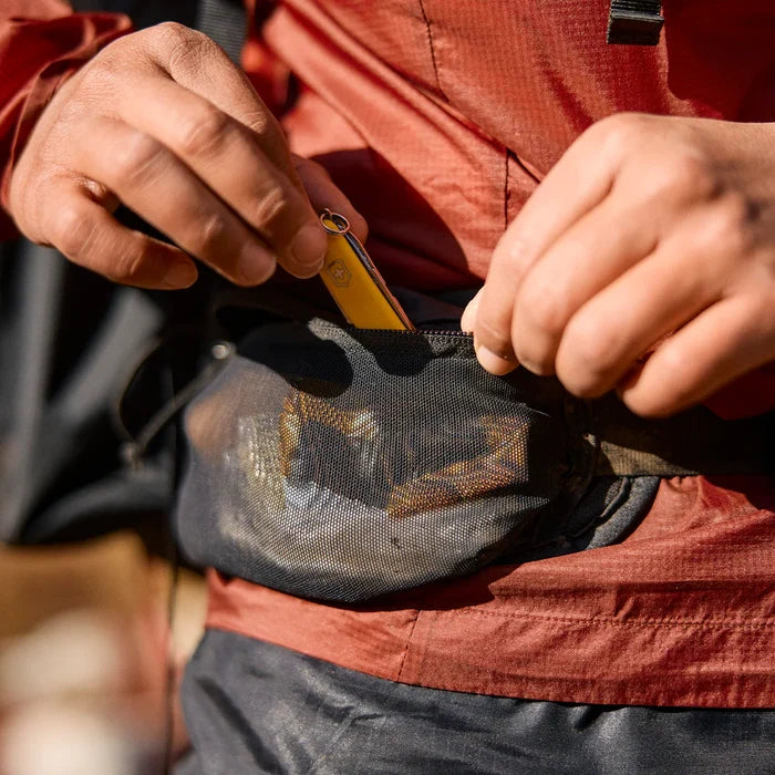 Gossamer Gear Fast Belt V2 worn at the waist, packed with a knife and gear visible through mesh