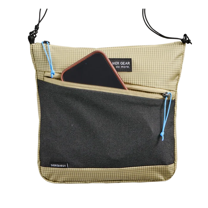 Gossamer Gear Sidequest in tan – front pocket holding a phone