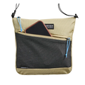 Gossamer Gear Sidequest in tan – front pocket holding a phone