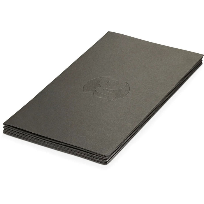 Gossamer Gear Thinlight Foam Pad 1/8" folded into a flat stack, embossed logo on top