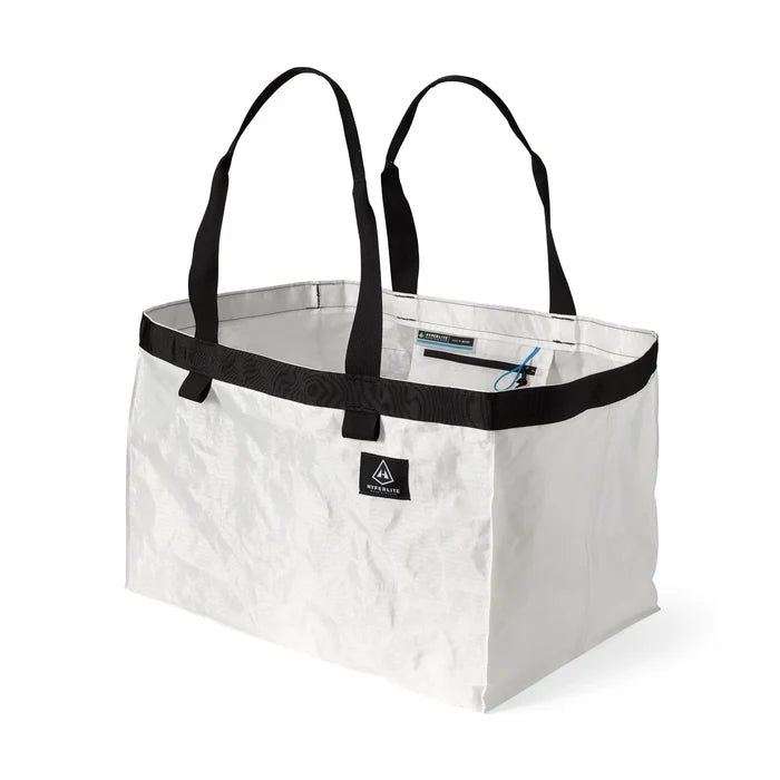Hyperlite Mountain Gear G.O.A.T. Tote 70L in white, open showing large interior – angled studio view