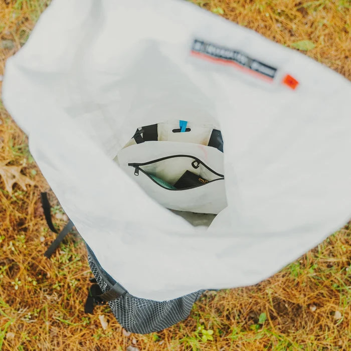 Hyperlite Mountain Gear Inside Pack Pocket clipped inside a pack, top-down view