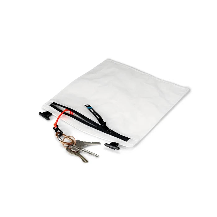 Hyperlite Mountain Gear Inside Pack Pocket laid flat with a set of keys, studio view