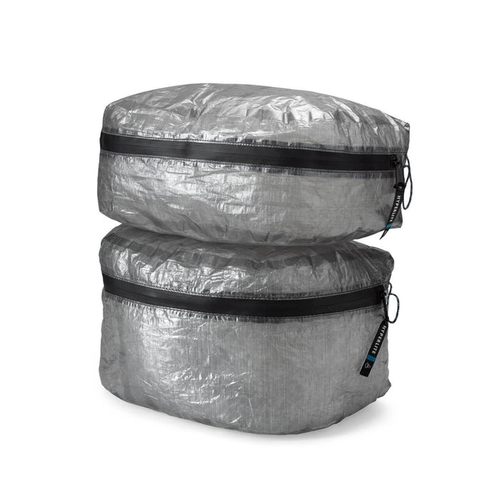 Hyperlite Mountain Gear PODS – two stacked pods, side view, black zips with Hyperlite pull tabs