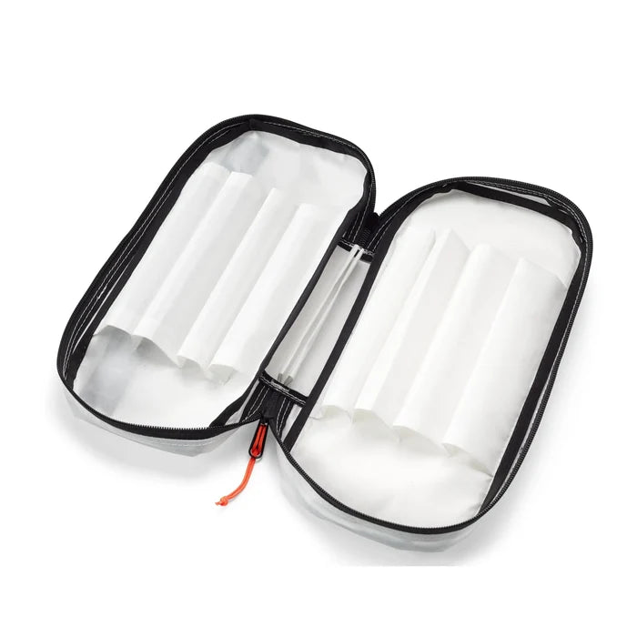 Hyperlite Mountain Gear Prism Ice Screw Case open with empty screw sleeves, angled view