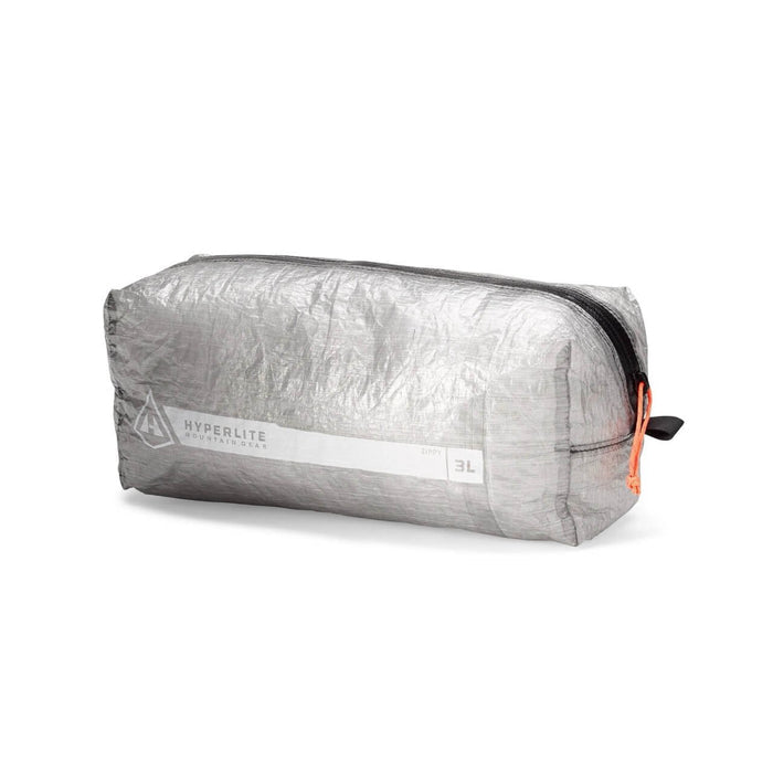 Hyperlite Mountain Gear Zippy pouches in 1L, 2L, and 3L sizes stacked upright, studio view