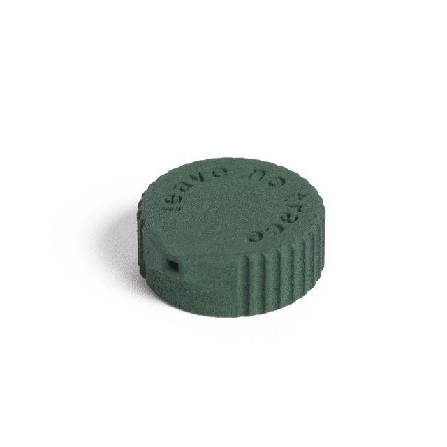 Igneous Bottle Cap Bidet – green cap, angled studio view