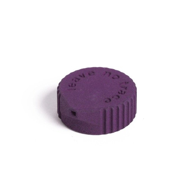 Igneous Bottle Cap Bidet – purple cap, angled studio view