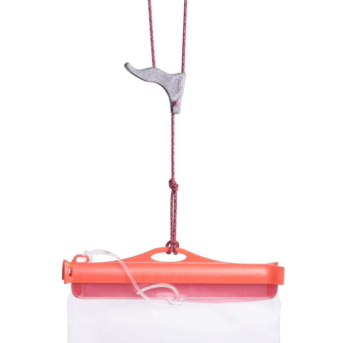 Igneous Hang System – suspending an orange dry bag from the cord