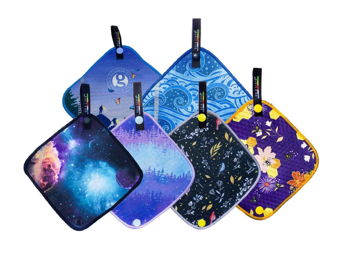 Kula Pee Cloth collection – six different prints including galaxy, forest, mountain butterflies, ocean waves, birds and florals, and honeycomb