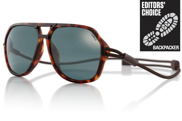 Ombraz Classic armless sunglasses, tortoise frame with grey lenses – angled studio view