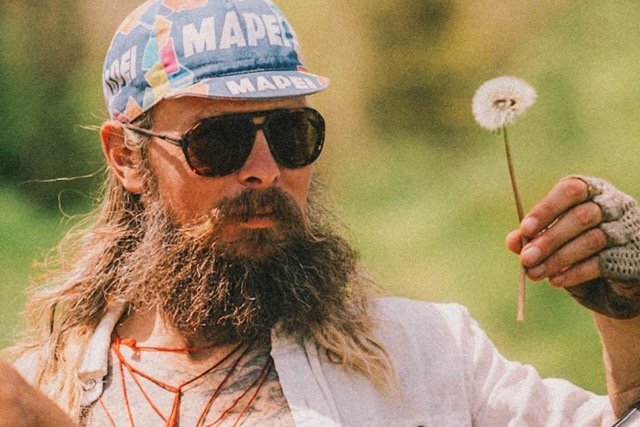 Ombraz Classic armless sunglasses worn by bearded hiker outdoors
