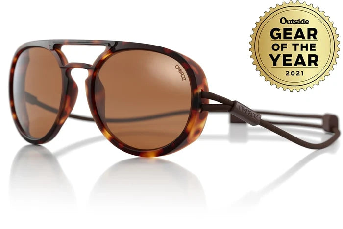 Ombraz Dolomite armless sunglasses, tortoise frame with brown lenses – angled studio view