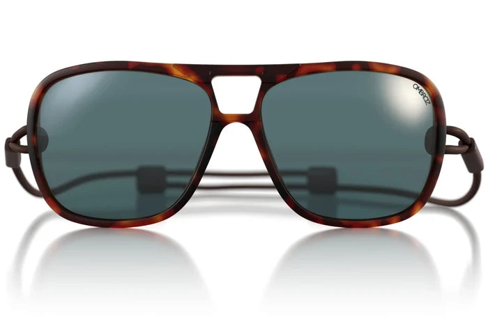 Ombraz Leggero armless sunglasses, tortoise frame with grey lenses – flat lay with attached cord