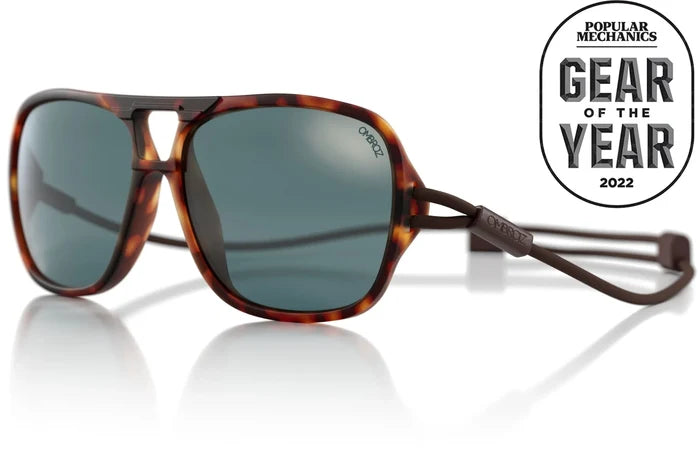 Ombraz Leggero armless sunglasses, tortoise frame with grey lenses – angled studio view