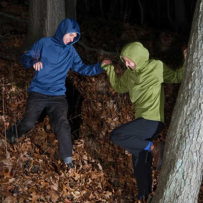 Pa’lante Grid Fleece Hoody – blue and green worn outdoors