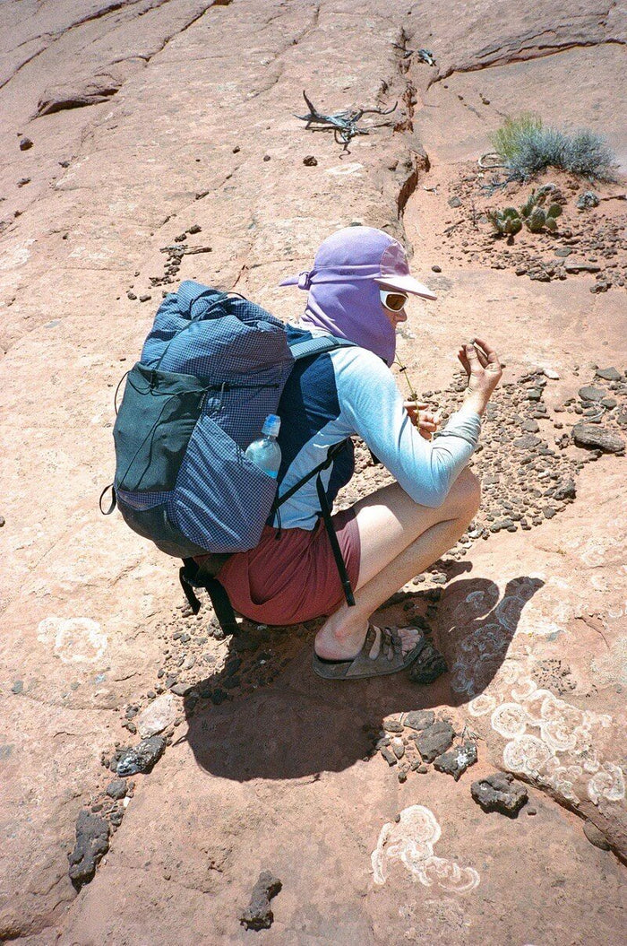 Pa’lante Sun Hat – worn scrambling outdoors