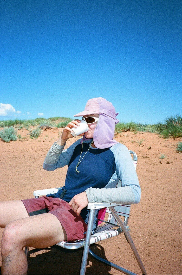 Pa’lante Sun Hat – worn while resting outdoors