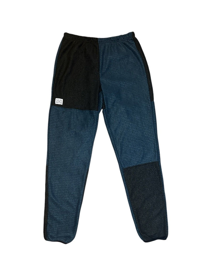Sambob Alpha 90 Pants in blue with black hip and knee panels – flat-lay front view, elasticated waist