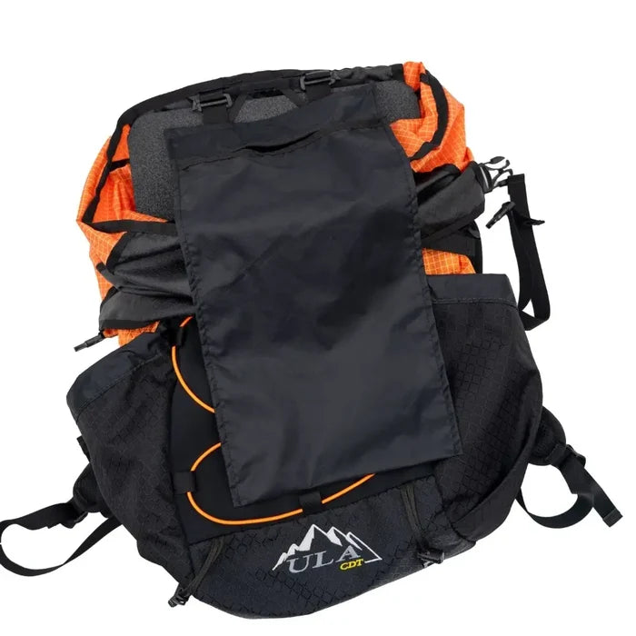 ULA hydration sleeve – black pack with orange trim, angled view