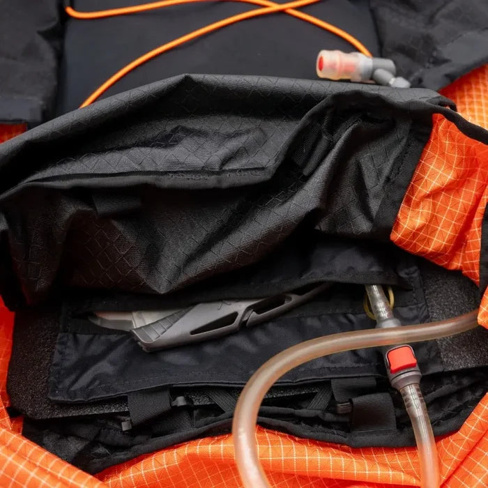 ULA hydration sleeve – opened pack top showing bladder pocket and hose