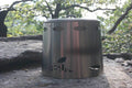 VESUV Titanium Windshield 0,9 L set up over a pot on a rock outdoors