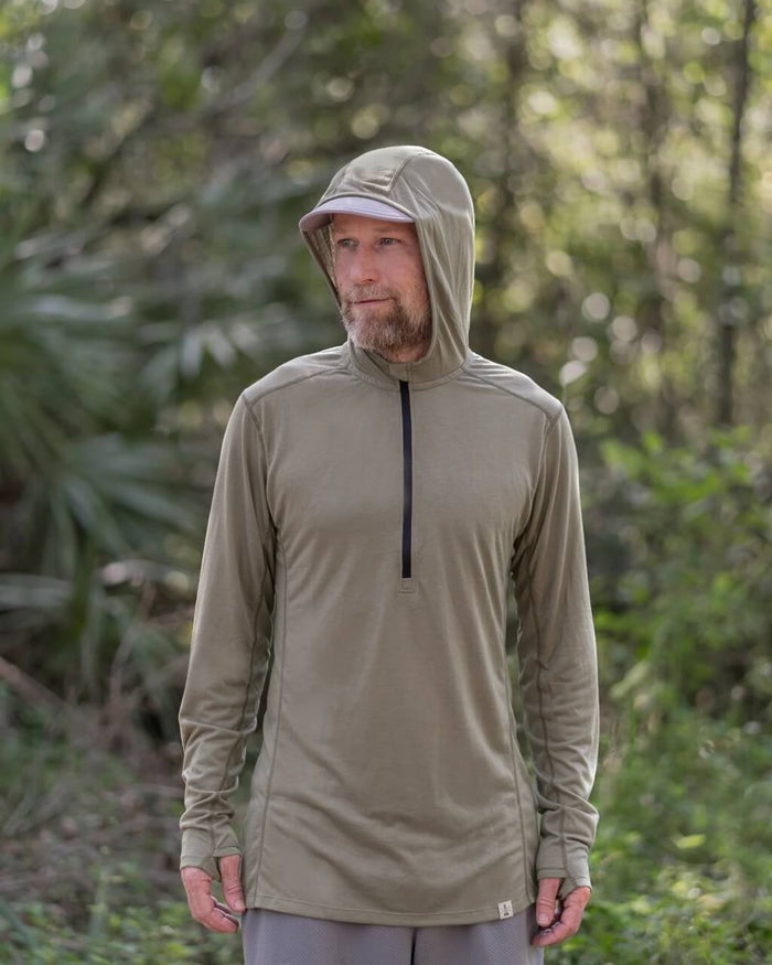 Zpacks Mirage Merino Sun Hoody in Light Olive worn outdoors
