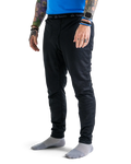 Zpacks Octa Fleece Thermal Bottoms in black – worn, front three-quarter view