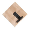 Zpacks Stick on Toggle mounted on a tan fabric square – top view