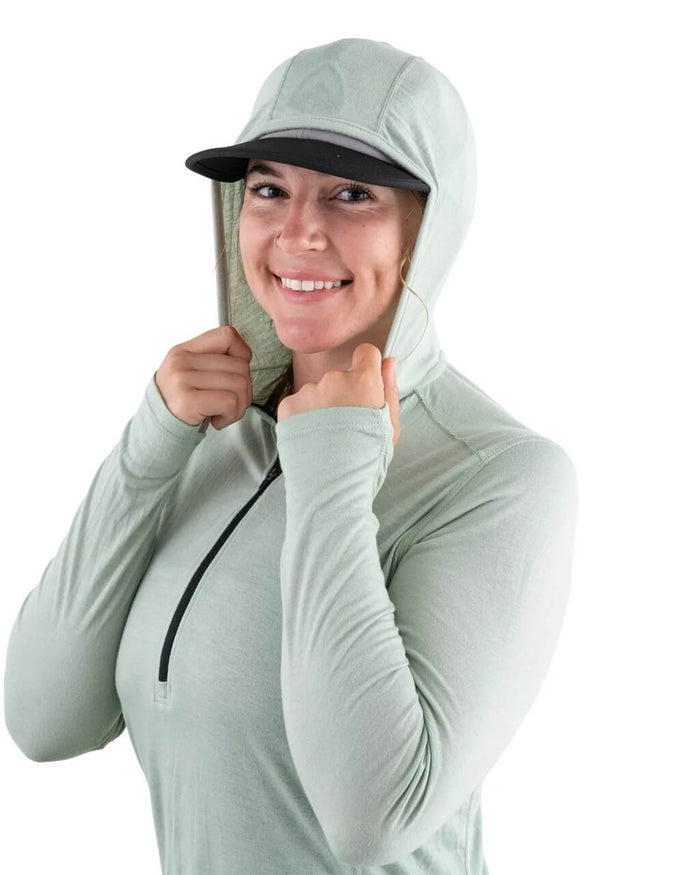 Zpacks Women's Mirage Merino Sun Hoody in Mint worn with hood up